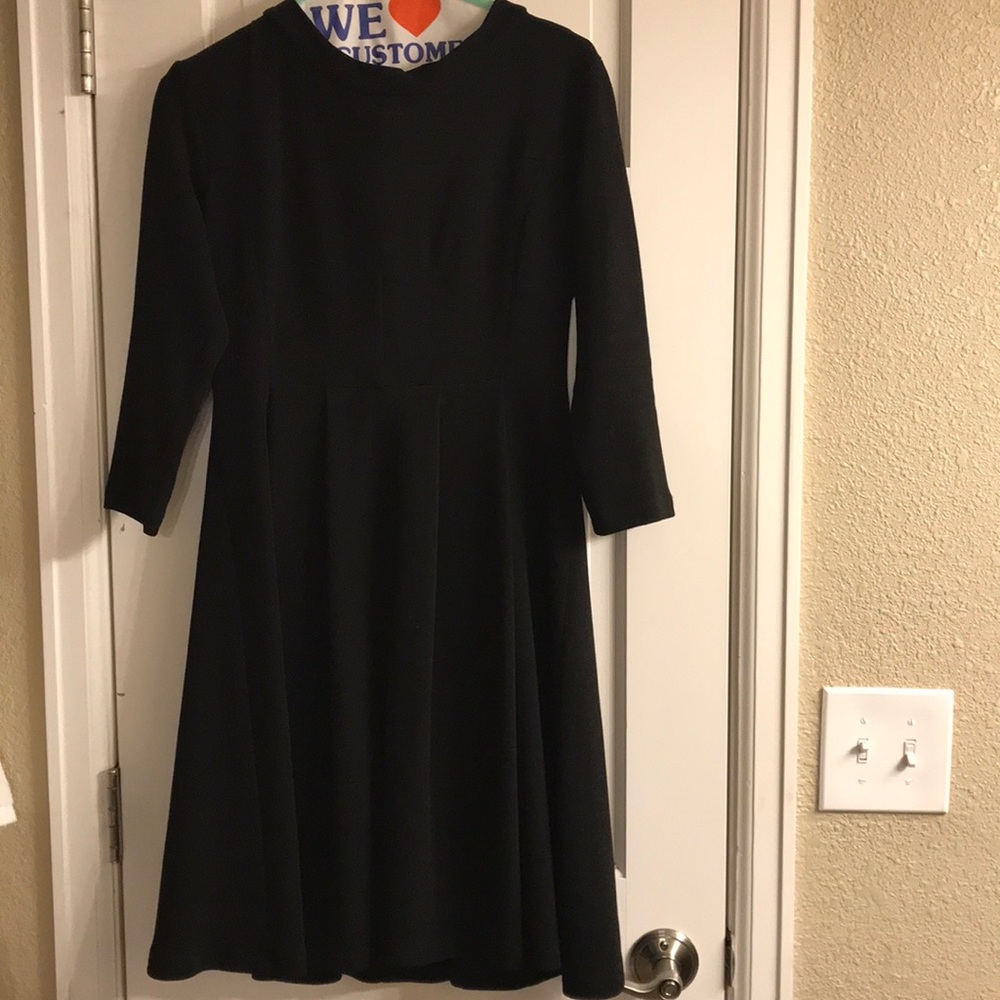 Maternity black three quarter sleeve dress.